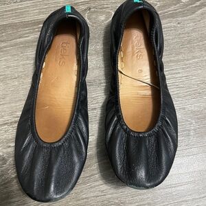 Black leather tieks